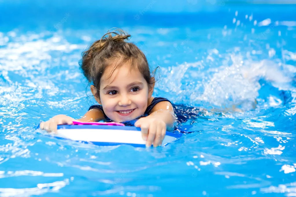 little-girl-learning-swim-pool_98296-1166